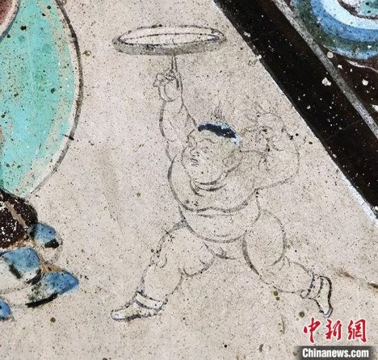 敦煌莫高窟第79窟(盛唐)中的“顶盘童子”。(敦煌研究院供图)